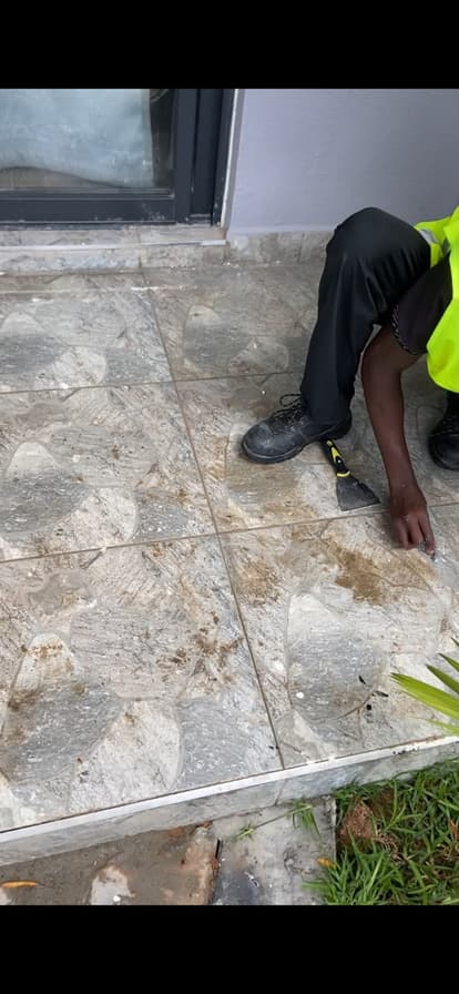 A Lavender cleaner removing residue from a tiled floor